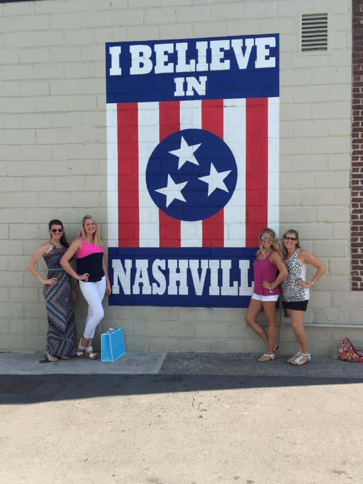 I believe in Nashville sign with 4 girls around it.