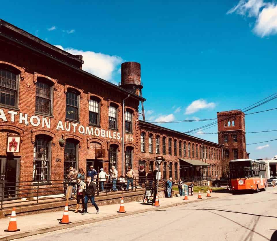 Outside view of an old factory that has been turned into shops.