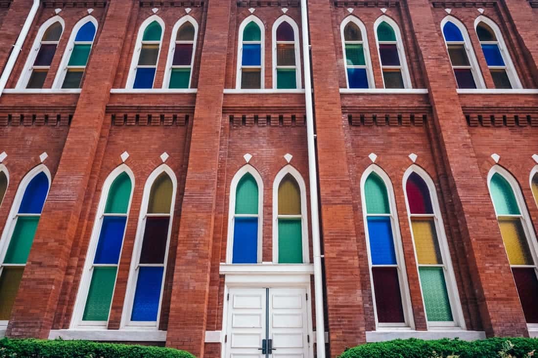 The tall, stained glass windows of The Ryman.