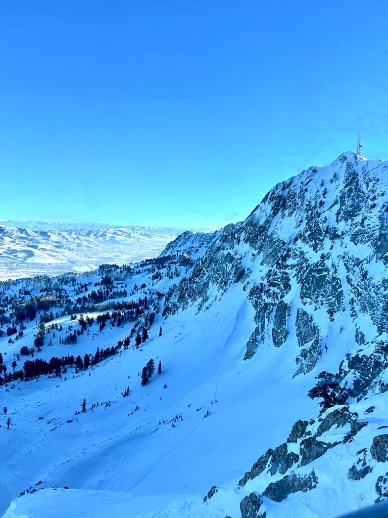The top of the rocky face view that lays behind the John Paul Lodge.