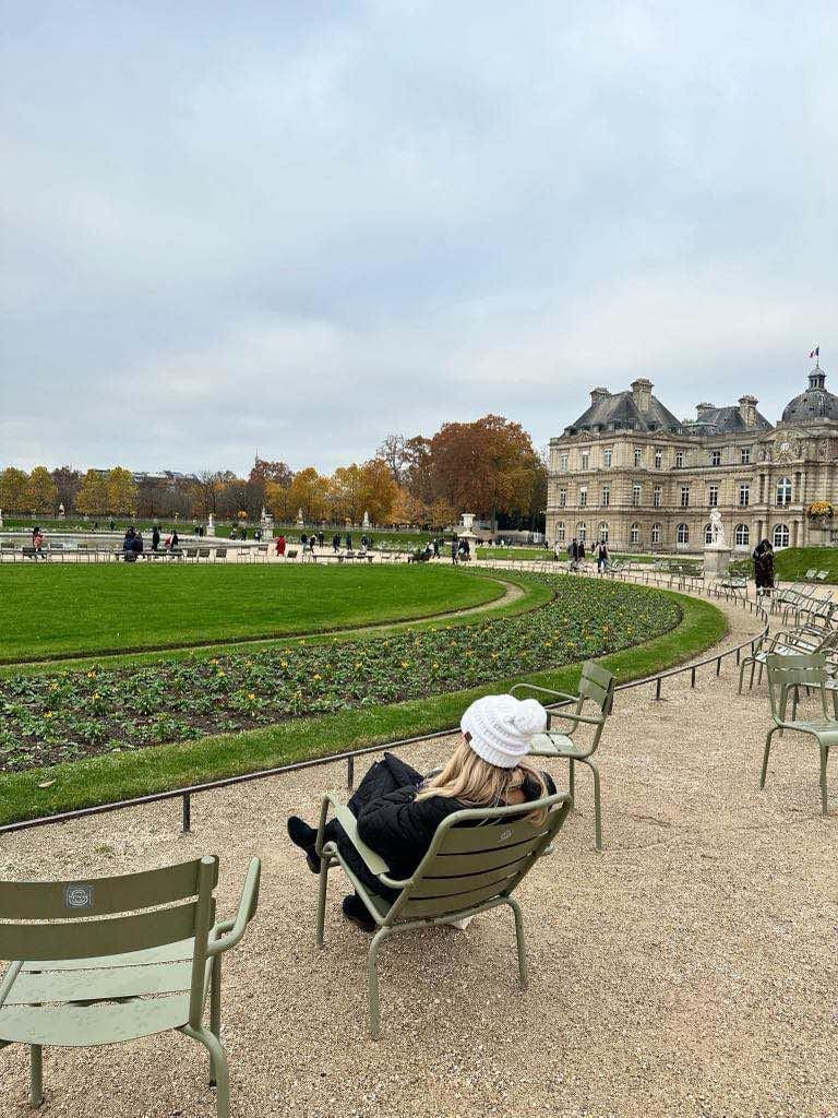 Girl resting at the Luxembourg Gardens in Paris.