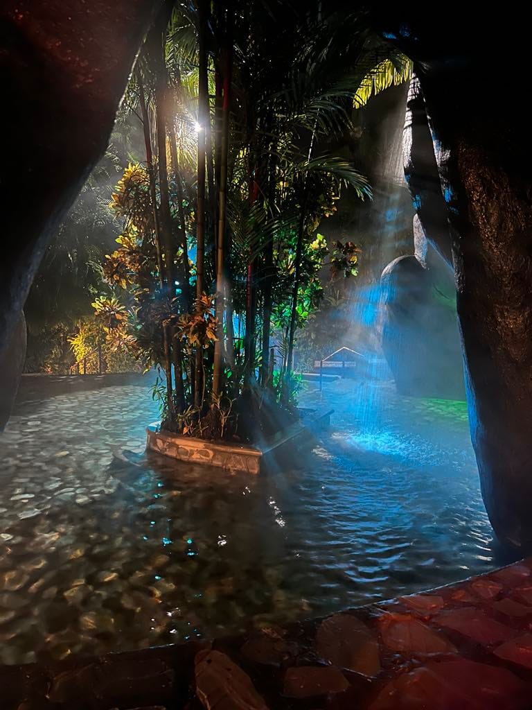 Night view of the caves and mist at the Baldi Resort while on a Costa Rica with Kids trip.