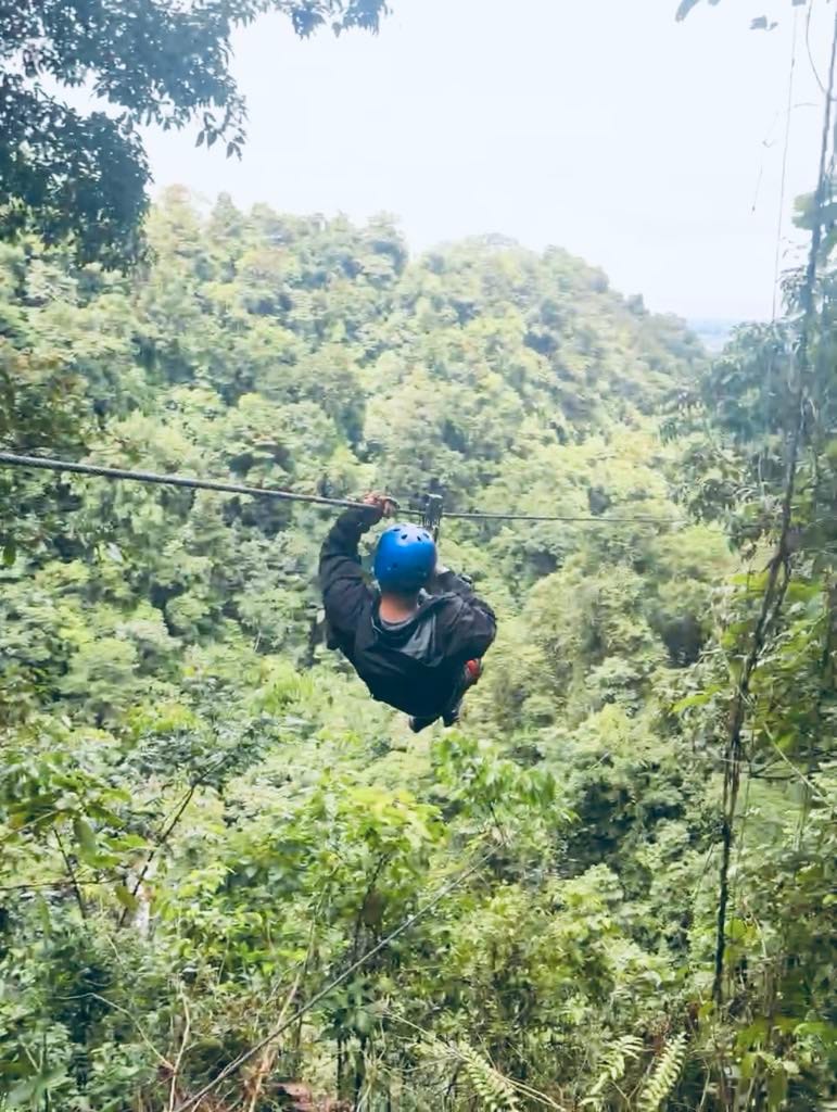 Man ziplining in Costa Rica.