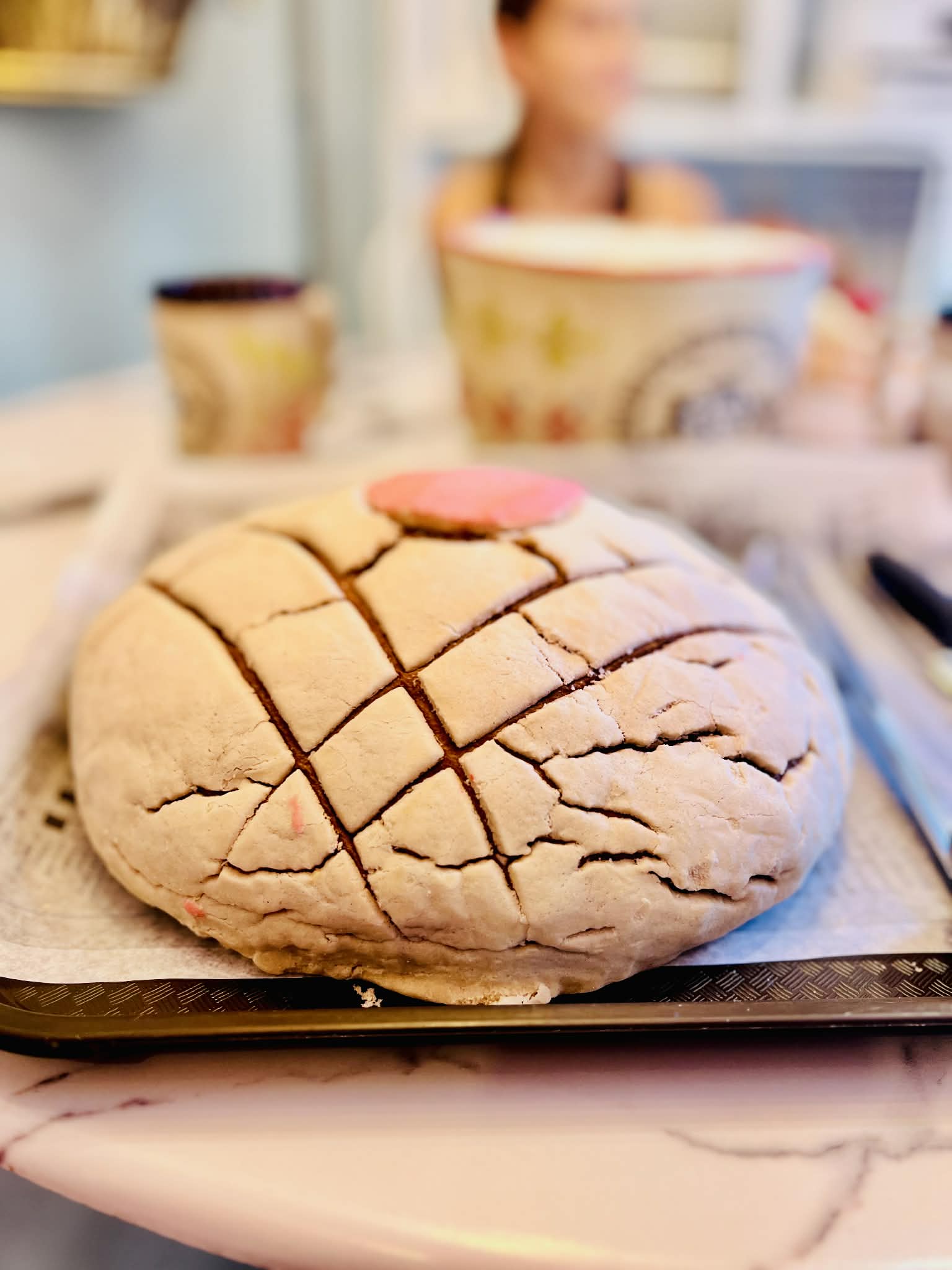 A huge concha bread.