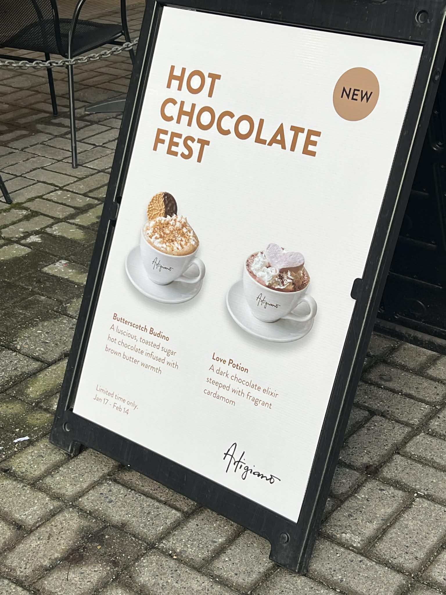 A sign reading "Hot Chocolate Fest" and showcasing two different hot chocolates.