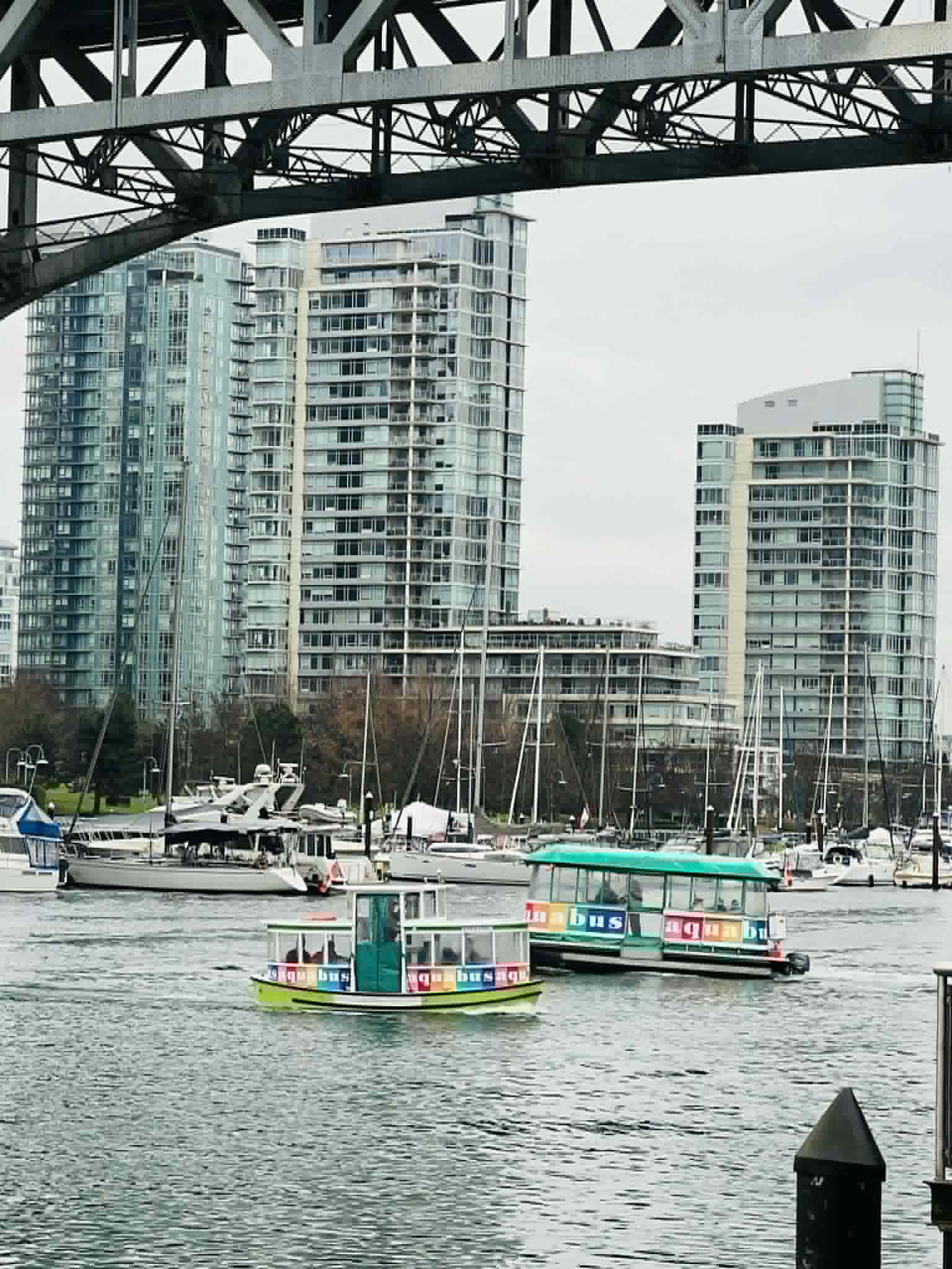 Two ferry boats cross the river in Vancouver.