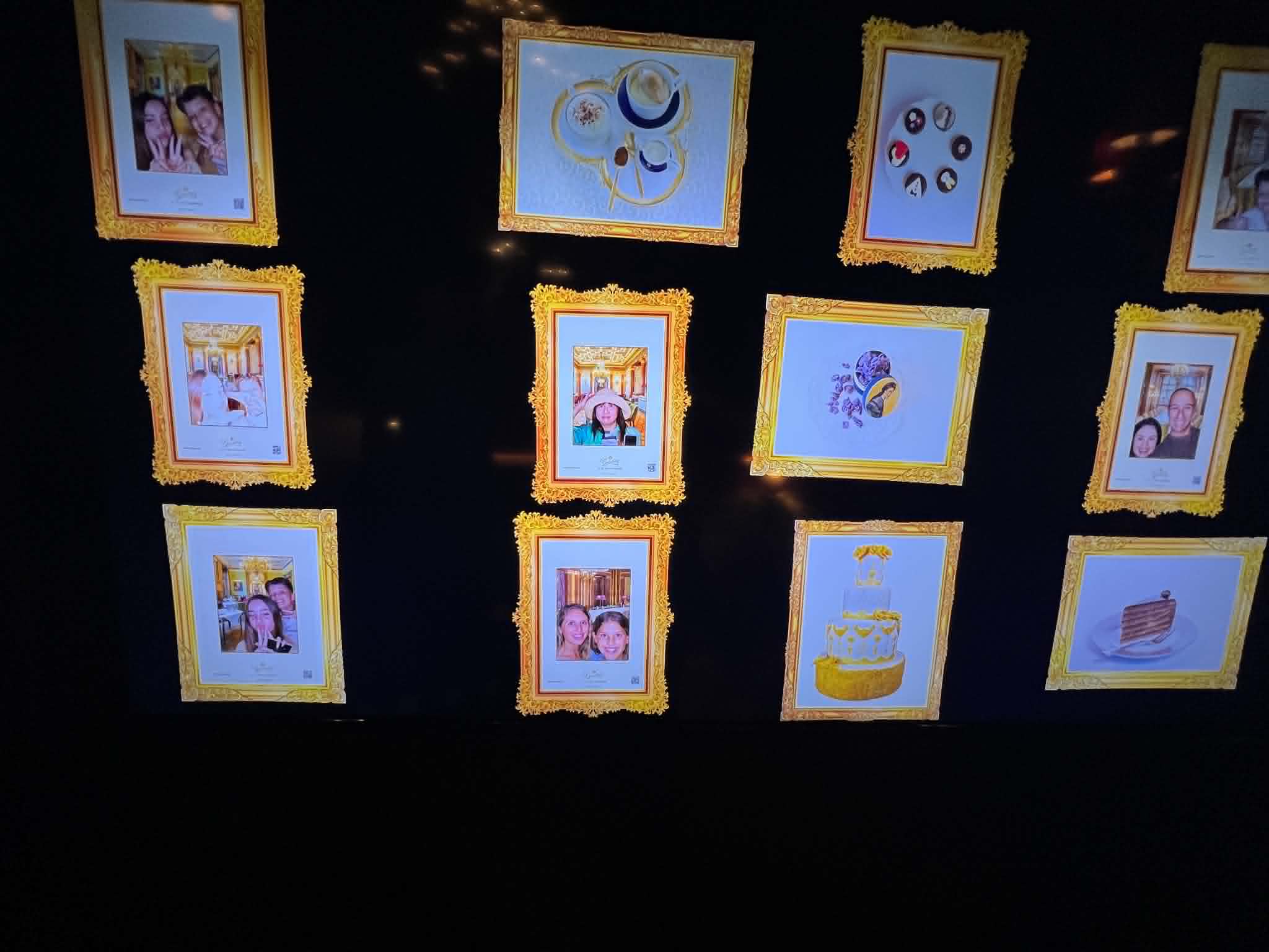 TV showing pictures that people took at restaurant.