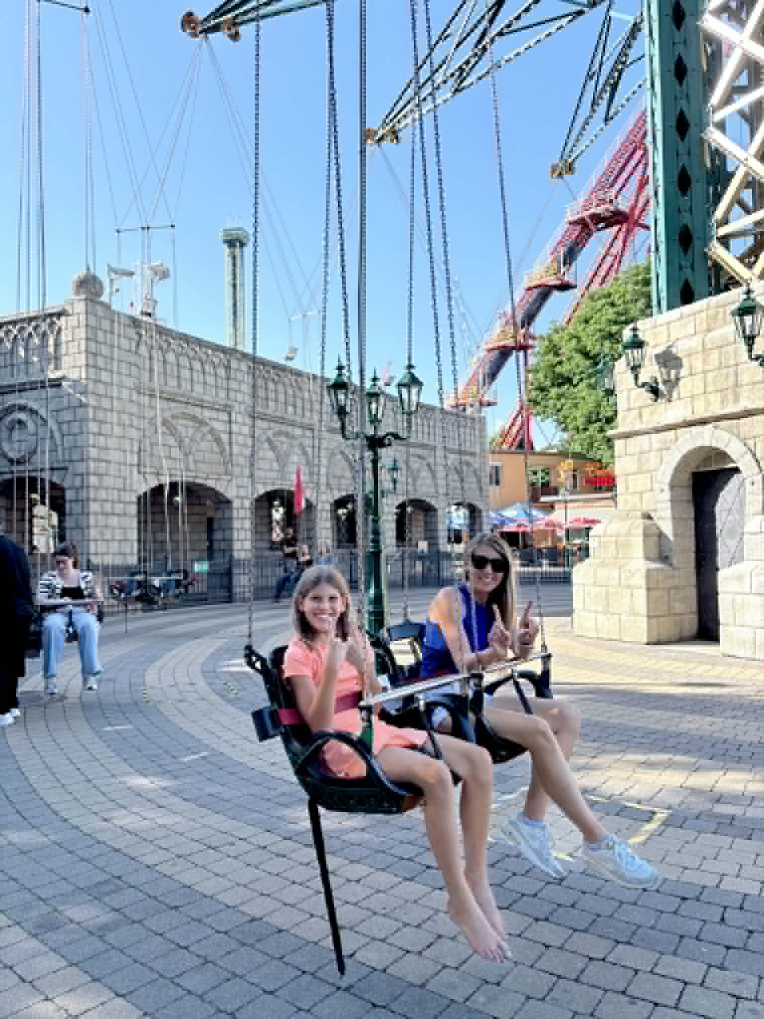 Girl and Women going on swings