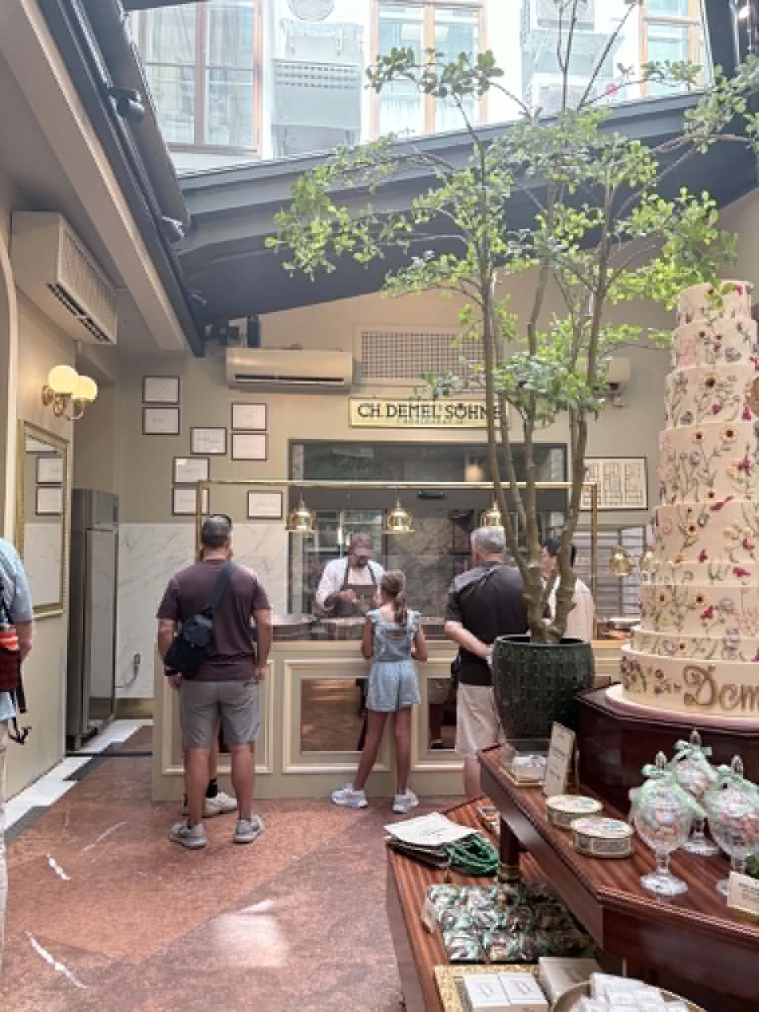People watching desserts be made.