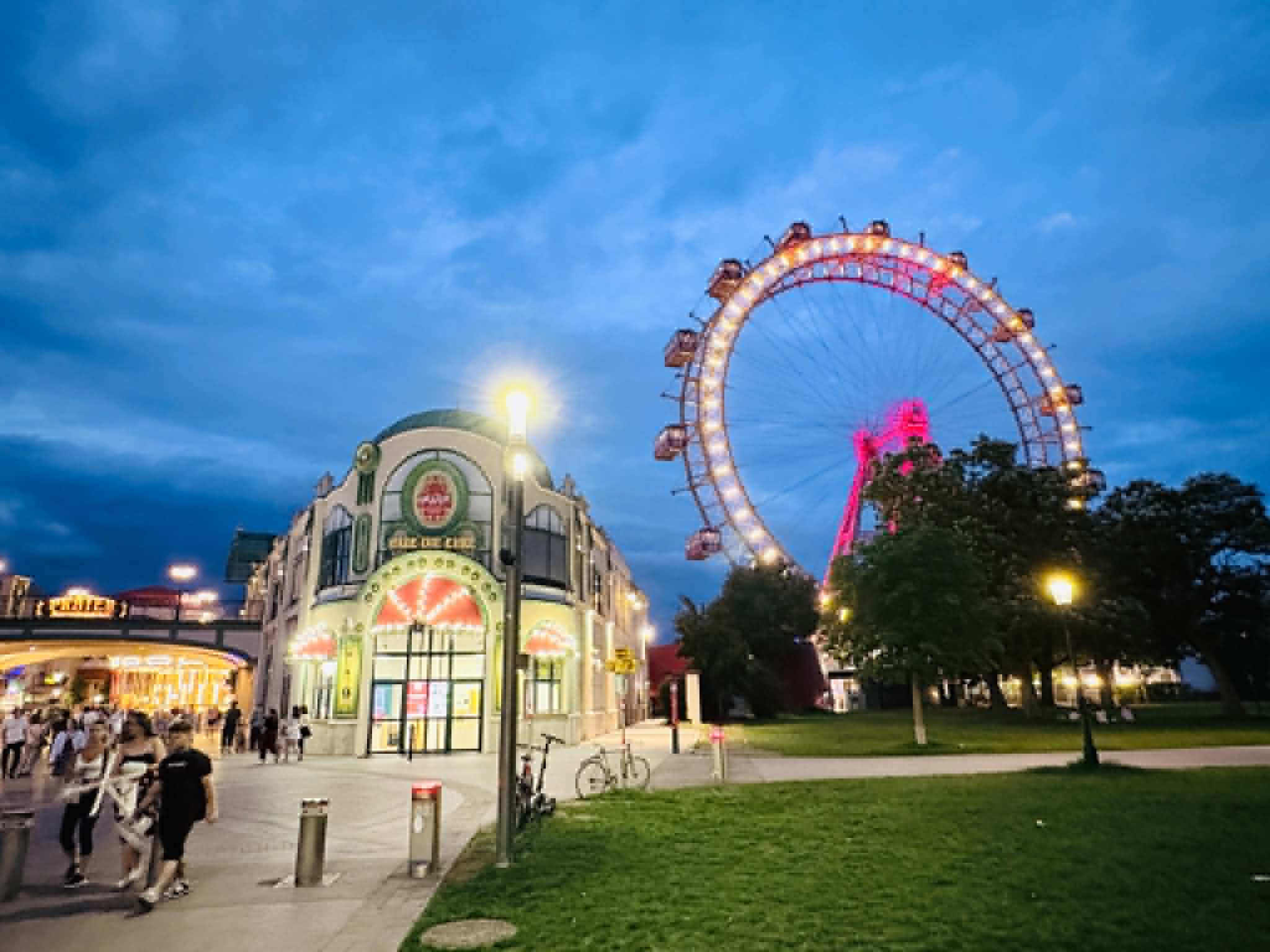 Ferris Wheel with restaurant at night.