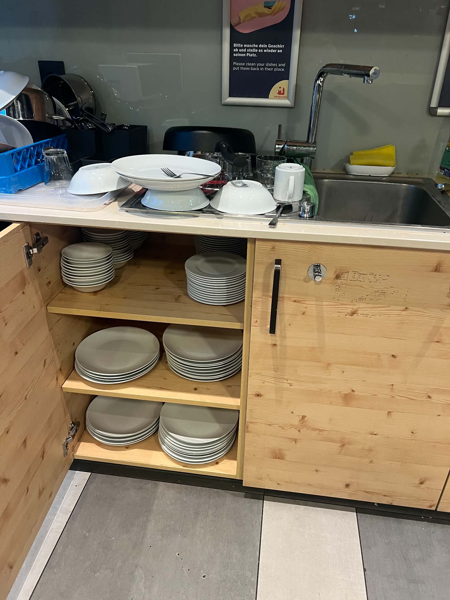 A picture of dirty dishes in the kitchen at the Meininger hotel in Zurich.