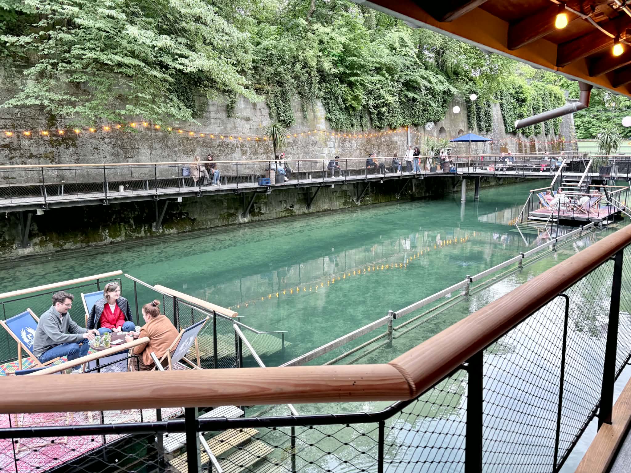A view of the swimming pool and tables at the restaurant, Rimini in Zurich, Switzerland.