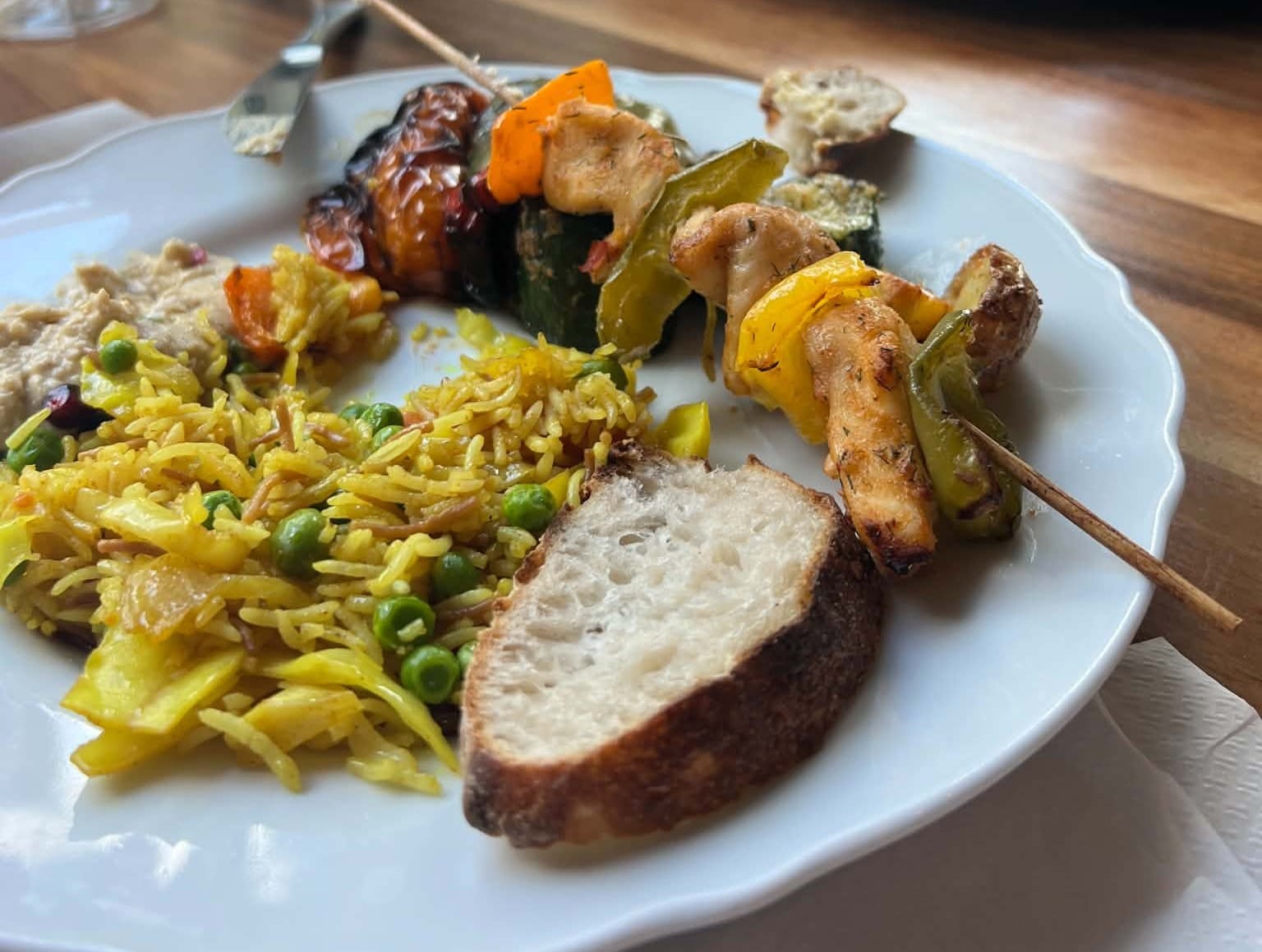 A plate of food at Olive Ladencafe to show what our kids put on our plates at this pay by weight restaurant in Zurich.