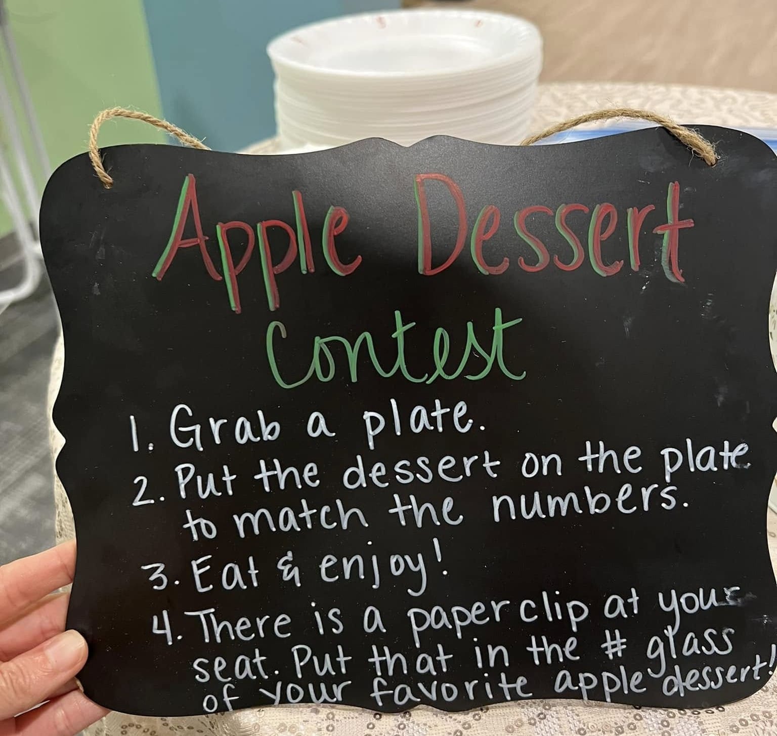 A sign explaining the Apple Dessert Contest for Feast of Trumpets.