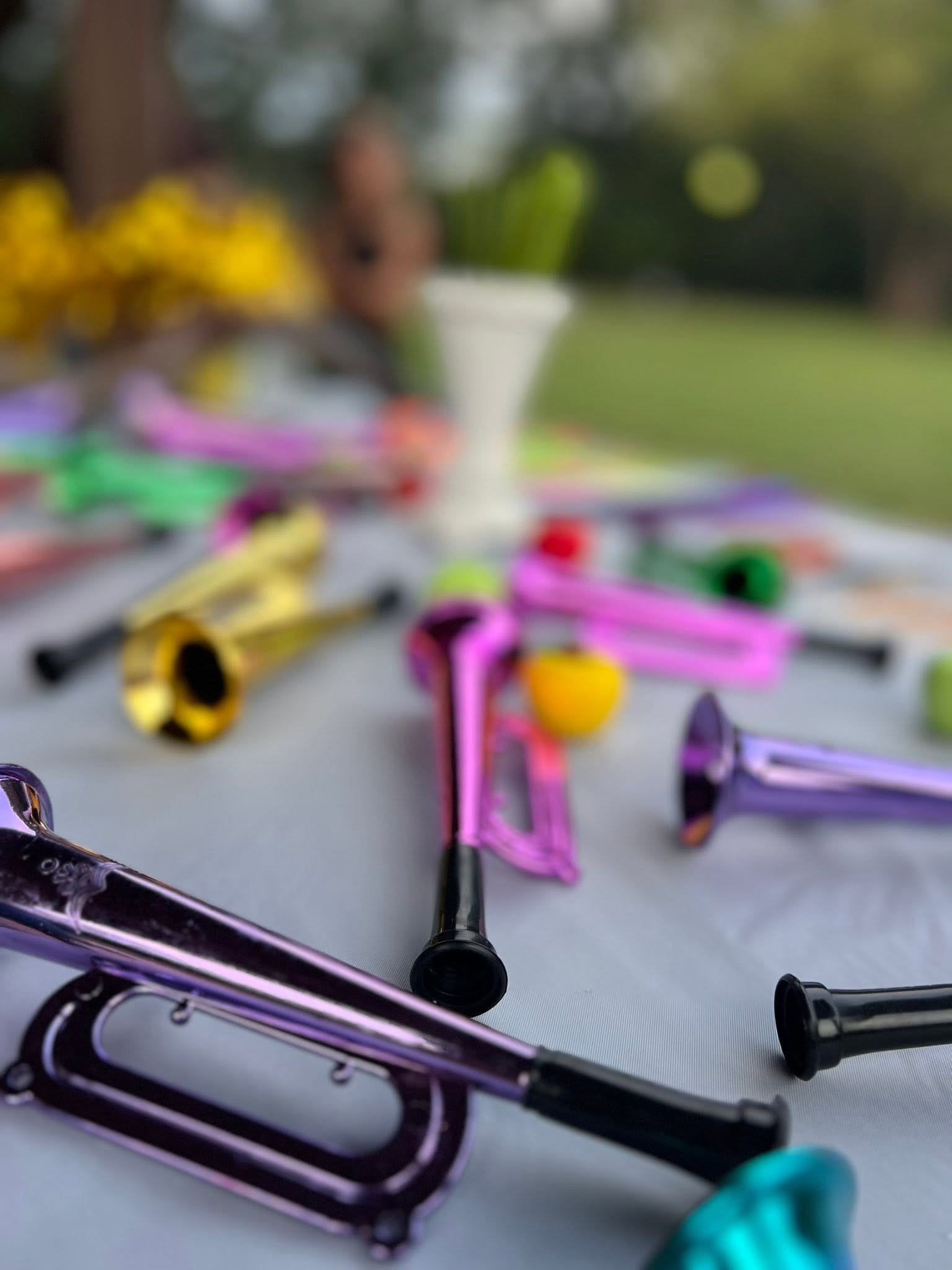 Feast of Trumpets is all about Jesus - a table full of colorful kid trumpets.